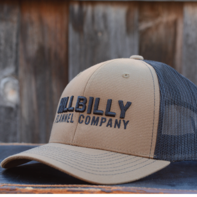 3D Embroidered Hillbilly Flannel log on a Brown and Black 6 panel trucker cap Elevate your style with the 3D Stack Flat Bill Cap in brown/black